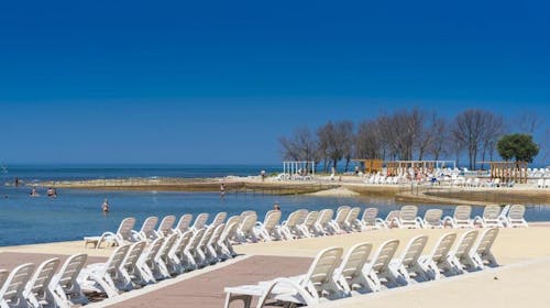Apartmani Polynesia Plava Laguna - Odmor u Istri uz polupansion, Umag, Istra, Hrvatska - 31.331 RSD - 2x noćenje u Studio Economy apartmanu 2+1 strana park za 2 osobe (dete do 4,99 godina besplatno), Polupansion (doručak i večera)